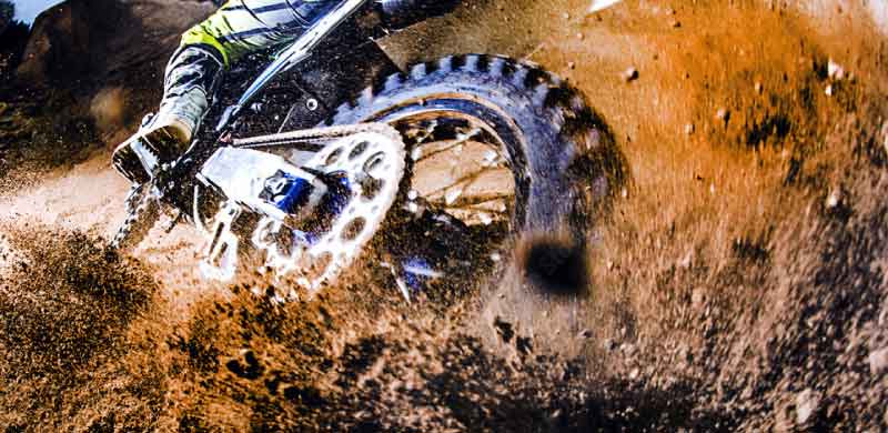 motocross riding on dirt track